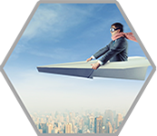 Corporate person sitting on a paper plane in the sky